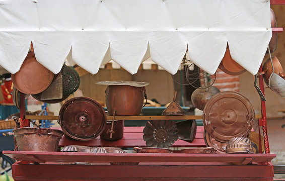 copper objects for kitchen and home for sale at flea market