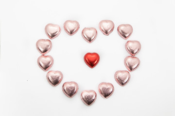 chocolate hearts candies on white