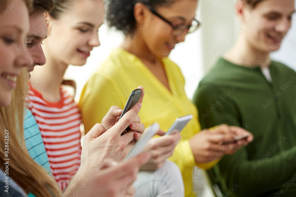 Poster close up of students with smartphones at school