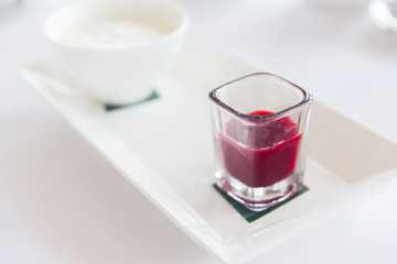 close up of yogurt and jam at restaurant