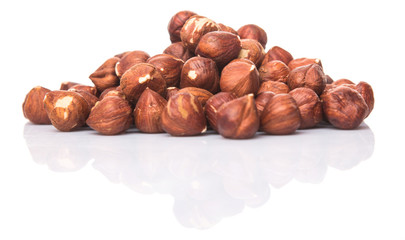Hazelnuts over white background