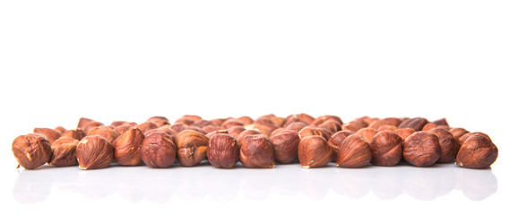 Hazelnuts over white background