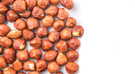 Hazelnuts over white background