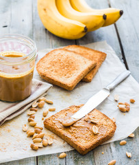 crispy toast with peanut butter, bananas, breakfast