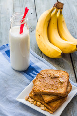 banana smoothie, toast with peanut butter, roasted peanuts, brea