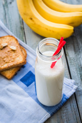 banana smoothie, toast with peanut butter, roasted peanuts, brea