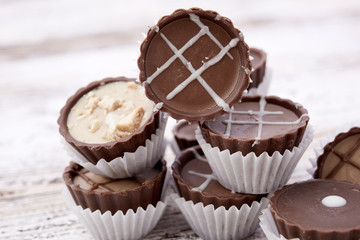 Dark chocolate on wooden background