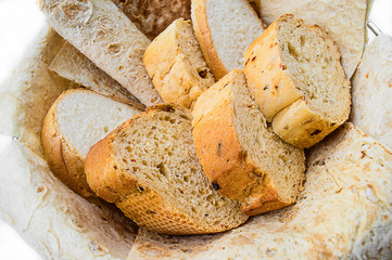 assortment of bread in basket, horizontal, close up