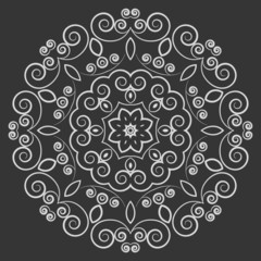Round lacy vintage pattern on black background