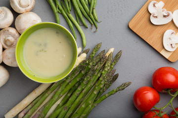 Asparagus soup with mushrooms and tomatoes 
