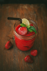 berry smoothie on the wood desk