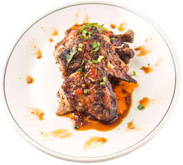 Roasted chicken piece coated with soy sauce