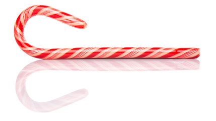 Christmas red and white stripe candy cane over white background