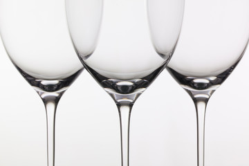 Three empty glasses of wine