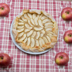 Home-made apple pie and apples.