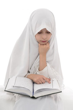 Pretty Muslim Girl Reading Holy Book of Quran