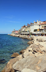 Fototapeta na wymiar Embankment of city on Adriatic Sea. Piran, Slovenia
