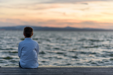 boy posing in the lagoon