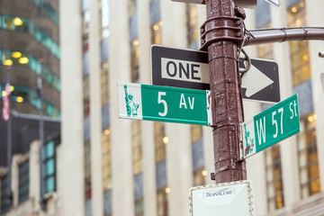 Fifth Avenue sign in pedestrian crossong, midtown Manhattan - obrazy, fototapety, plakaty