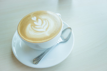 Hot cup of coffee latte
