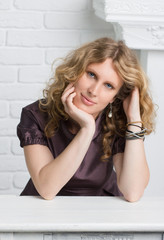 Naklejka premium Portrait of a beautiful pensive woman