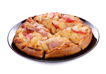 Delicious italian pizza on black plate