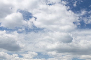 Fototapeta na wymiar Blue sky is full of huge white clouds