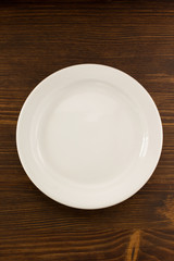 empty plate on wood