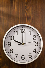 wall clock on wood