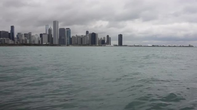The water of Lake Michigan moves in front of the Chicago skyline