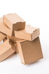 Fototapeta premium Brown cardboard boxes on a white background