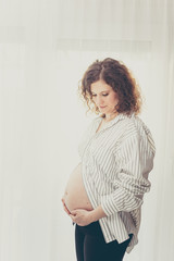 beautiful pregnant young woman