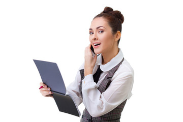 businesswoman talking on the phone and taking notes