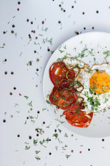 Fried egg on a plate with spices