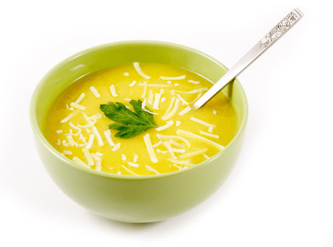 Pumpkin soup with grated cheese in a bowl