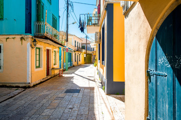Fototapeta na wymiar Street view with colorful old houses in Greece
