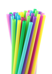 Colorful cocktail straws on white background 
