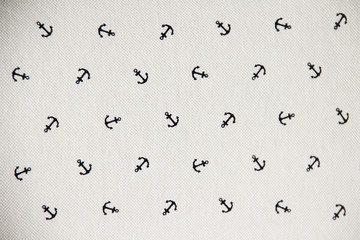 Fabric with anchor repeating pattern