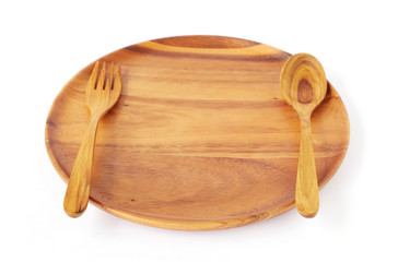Empty wooden plate with fork and spoon isolated on white backgro