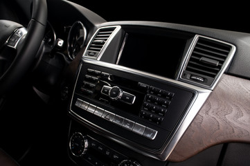 Obraz na płótnie Canvas Screen multimedia system. Modern car dashboard. Interior detail.