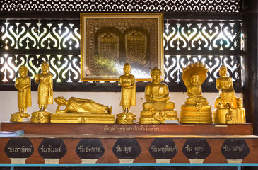 Golden buddha statues in various actions