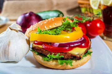 homemade hamburger with fresh vegetables, close up