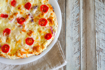 Pizza with cheese, top view