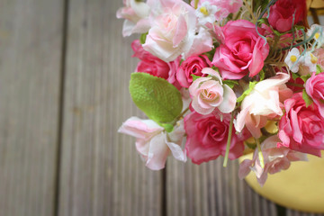 Beautiful vintage roses of artificial flowers