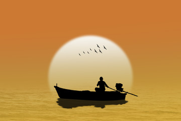 Silhouette fishing boat at sea sunset background.