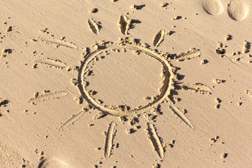 Sun drawing on the sand