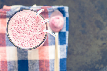 Glass of berry smoothie top view