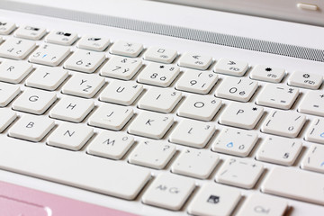 Detail of white Key Board Laptop Computer