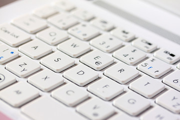 Detail of white Key Board Laptop Computer