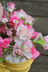 Beautiful vintage roses of artificial flowers